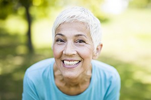 woman grinning from ear to ear