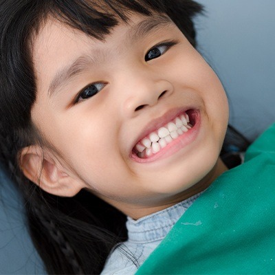 Smiling child in dental chair