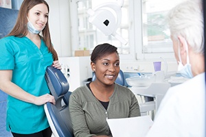 Patient and dentist talking