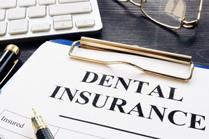 dental insurance form on table