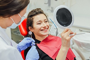 Patient admiring their new smile