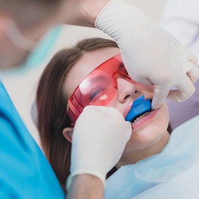 Patient receiving fluoride treatment