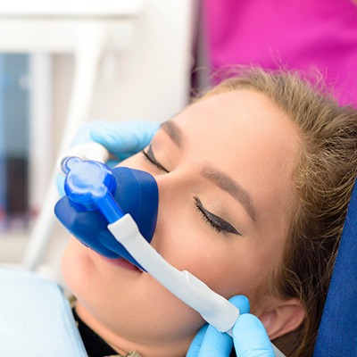 A woman getting nitrous oxide sedation, a form of sedation dentistry in Springfield