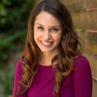 Woman outdoors smiling