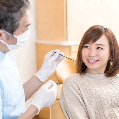 patient talking to her dentist