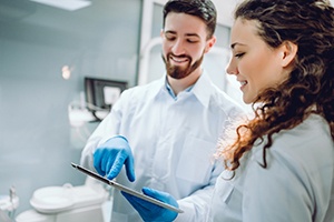 Dentist having discussion with a patient