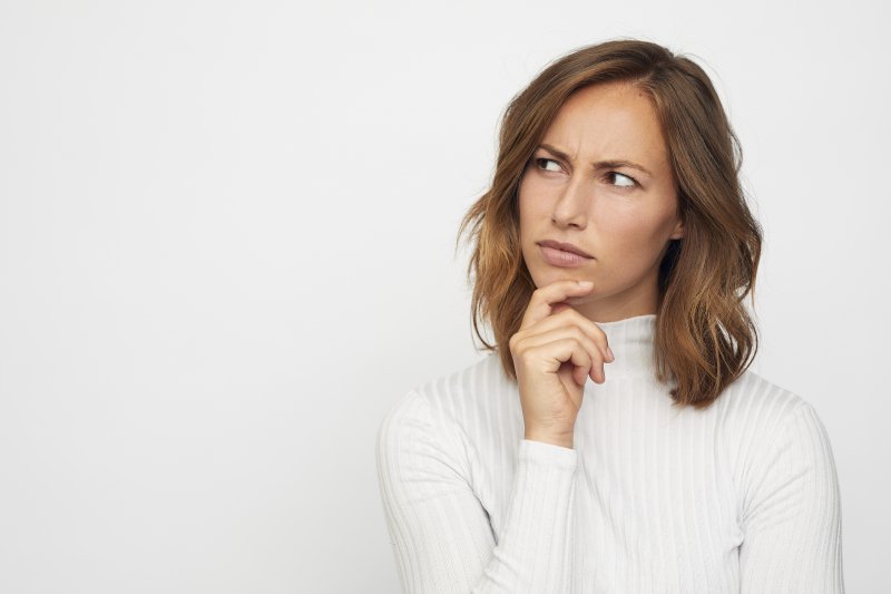 Closeup of woman pondering