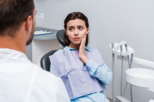 woman talking to her dentist