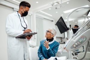 a patient attending their dental implant consultation